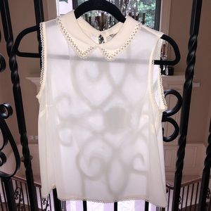 White Sleeveless Blouse